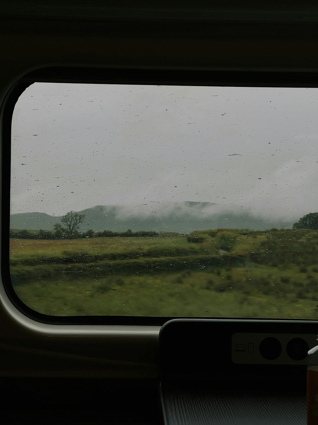 A view of a field from inside a vehicle