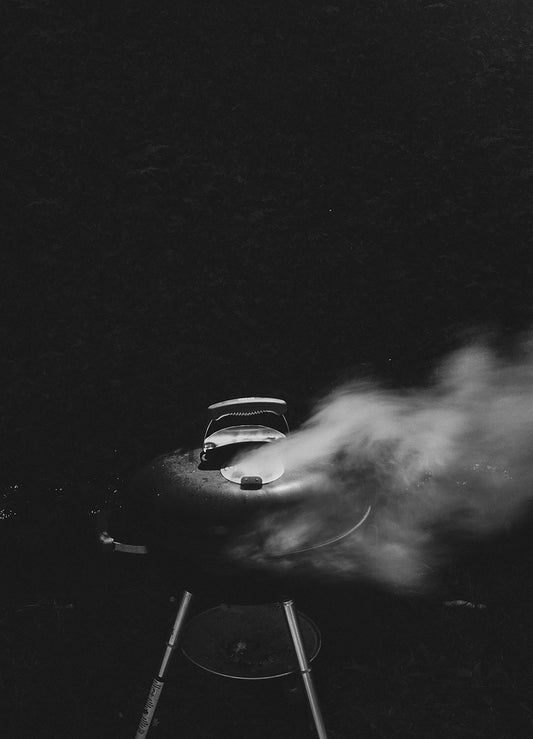 a black and white photo of a flying saucer